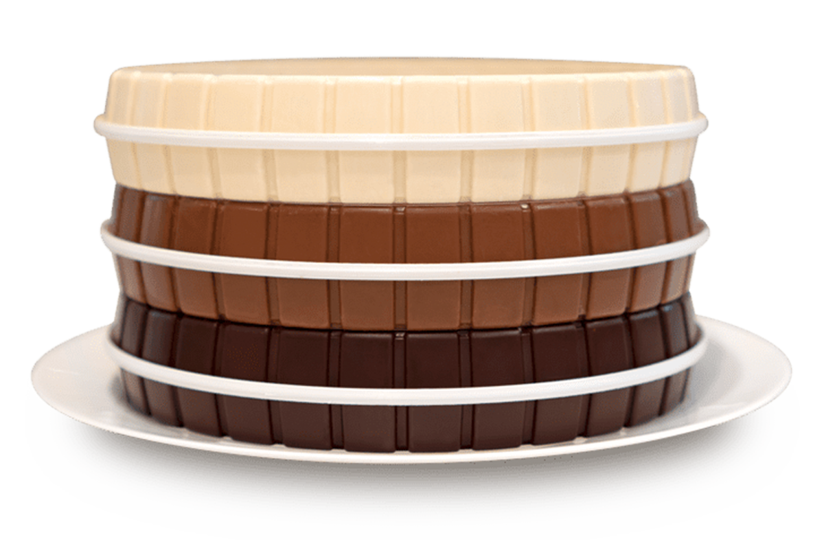 Stacked rings of dark, milk and white chocolate molded with the CocoTerra. Design. Decorate. Share.