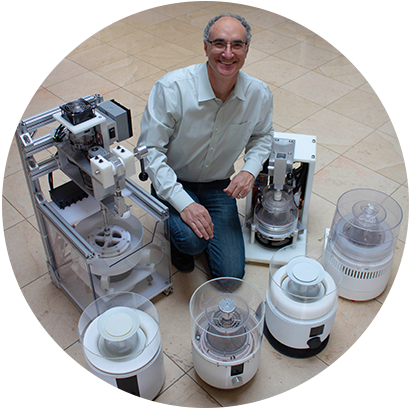 Nate Saal, CocoTerra founder and CEO surrounded by chocolate making equipment